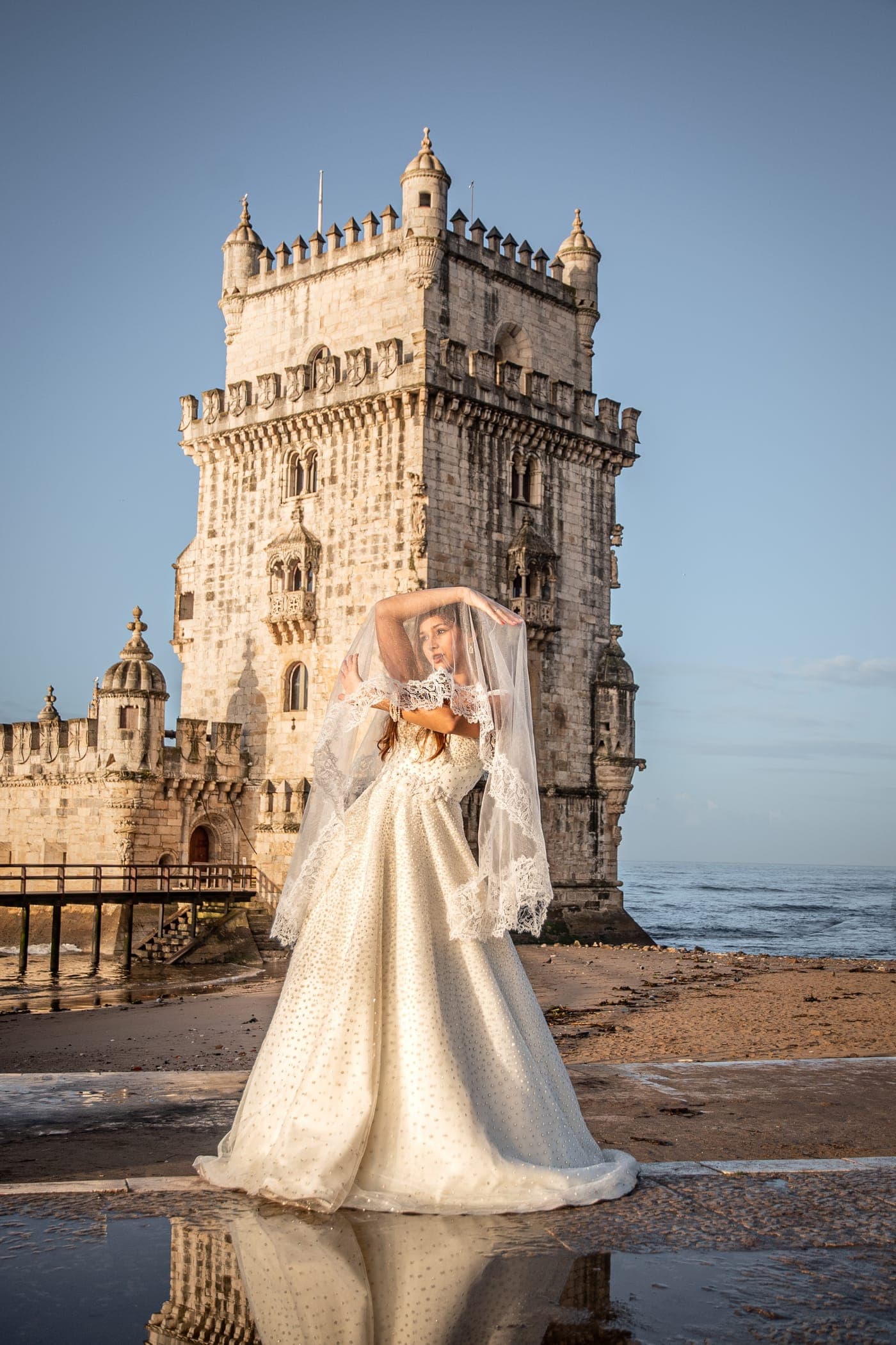 Beaded bodice and full tulle skirt on the river wall