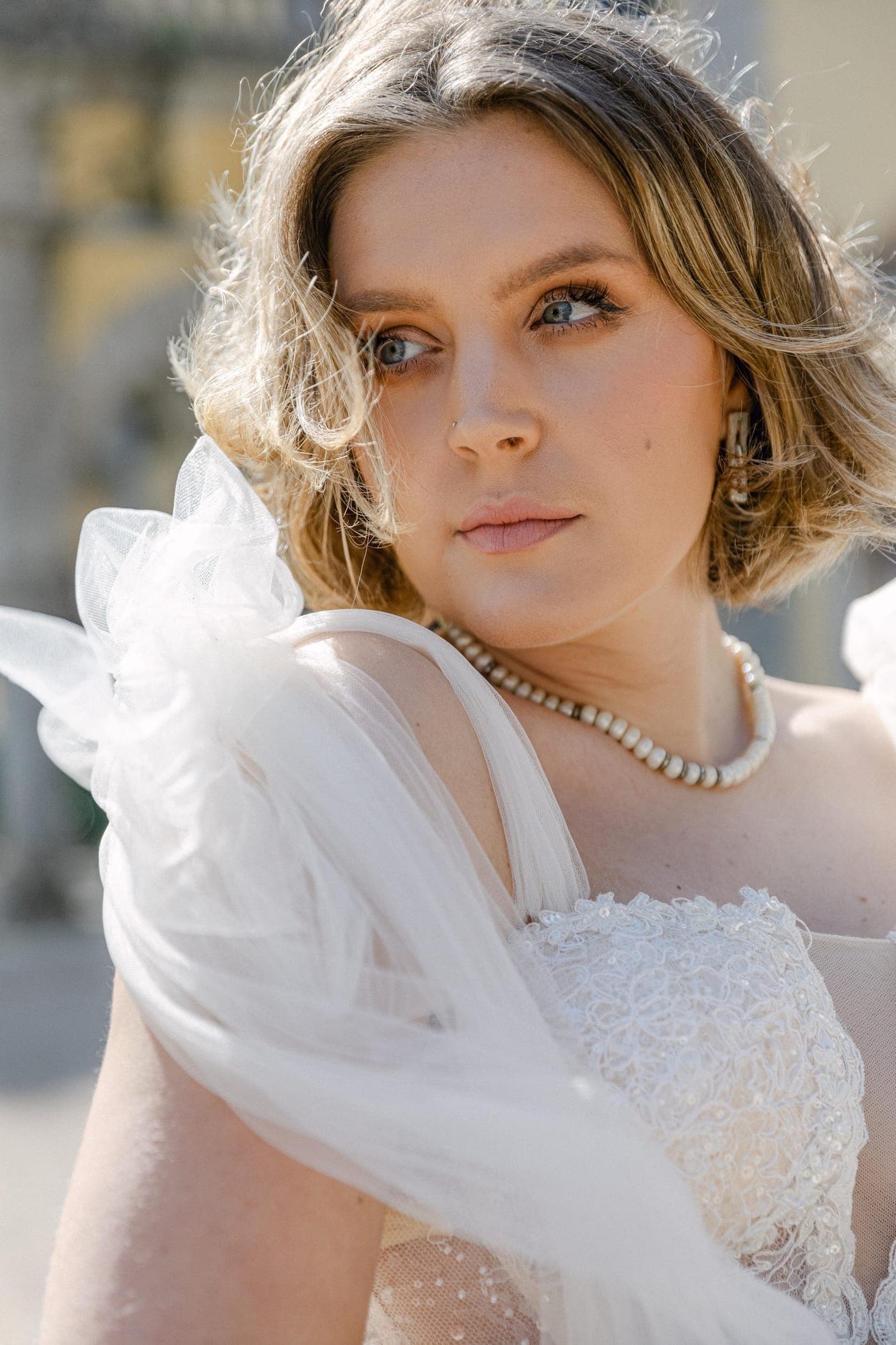 Portrait in pearls and organza sleeve