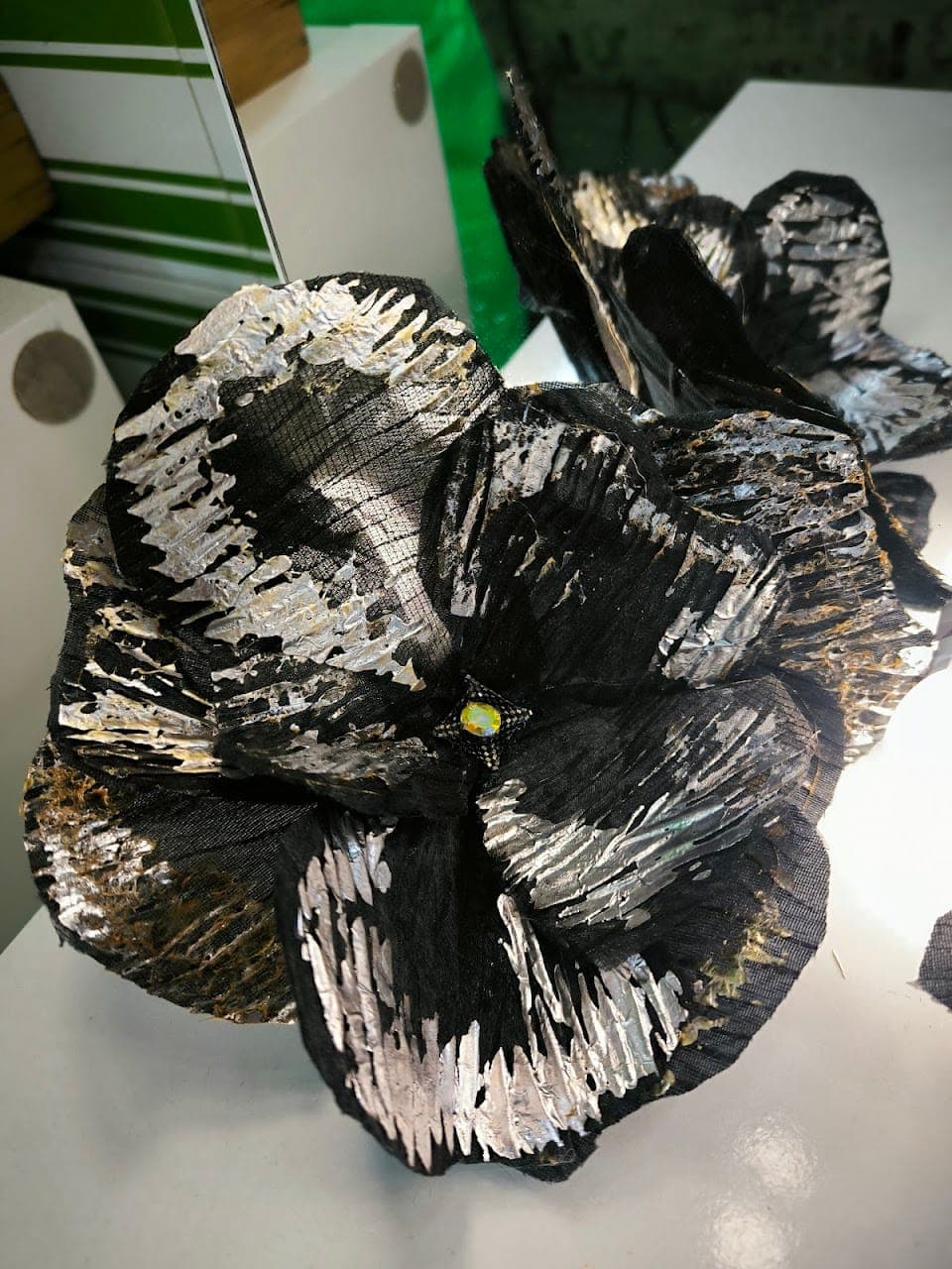 Petals painted and beaded, drying