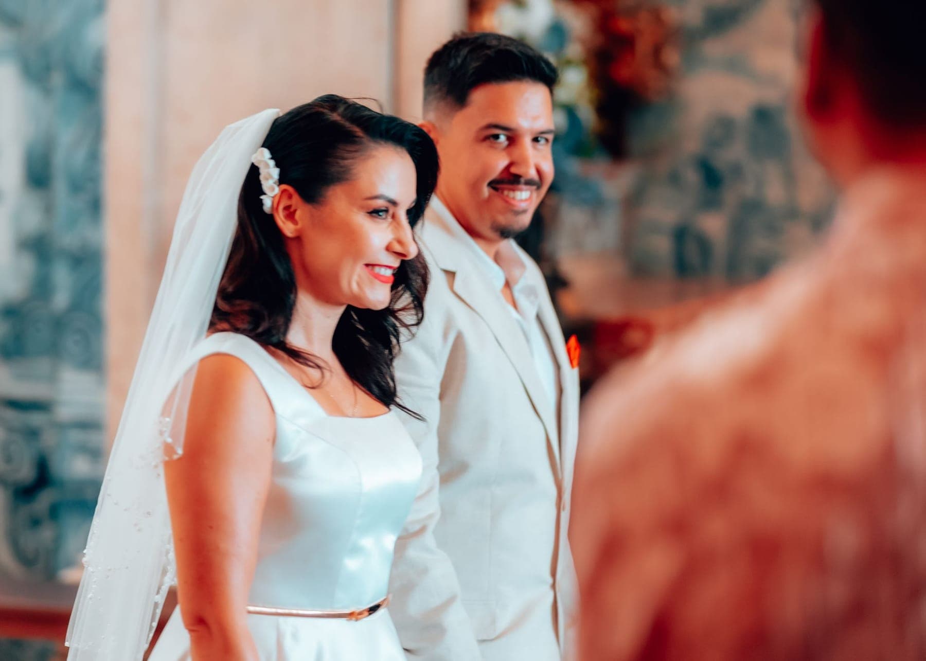 First kiss, guests behind