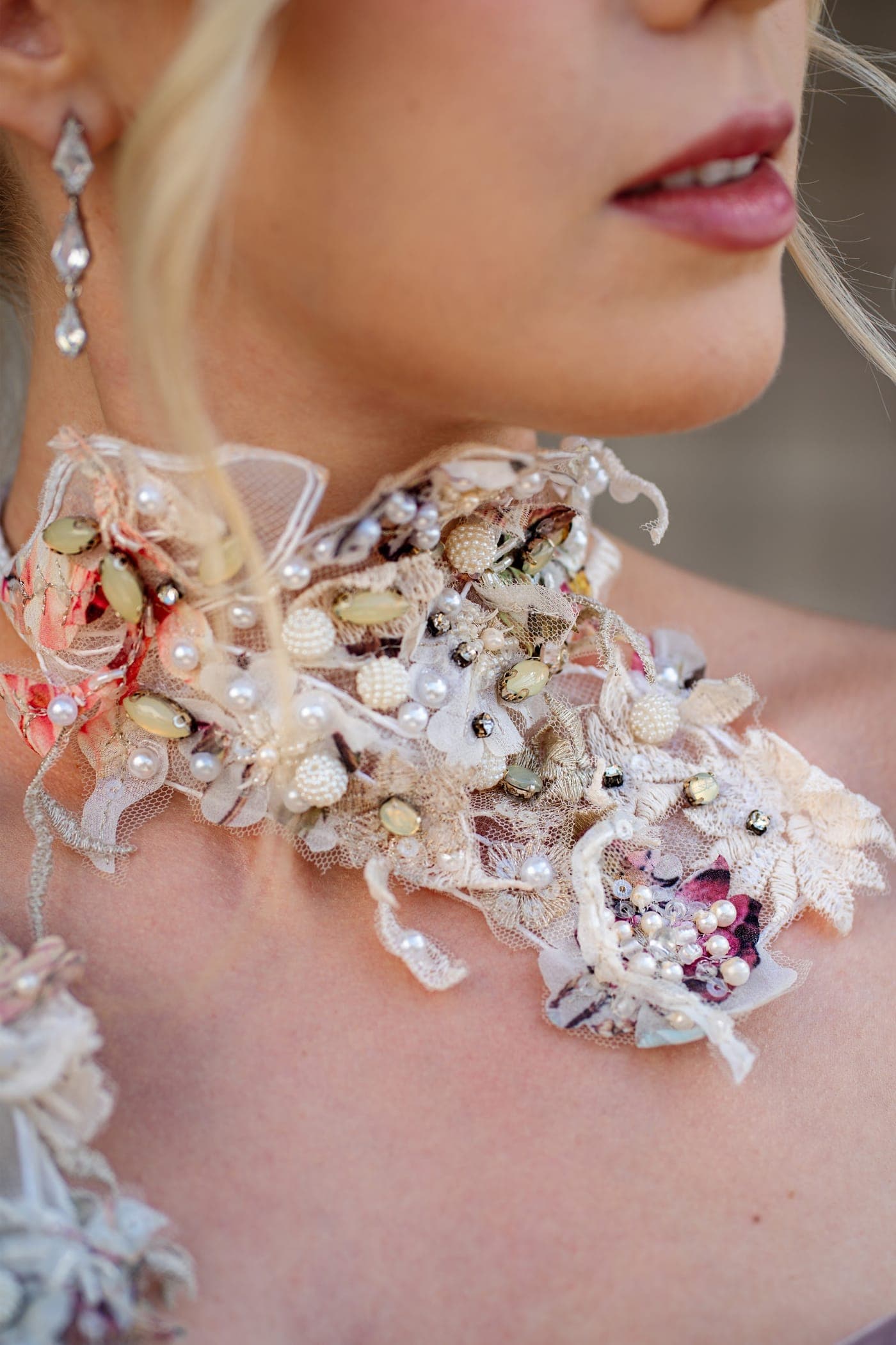 Detail: hand-made petals at the neckline